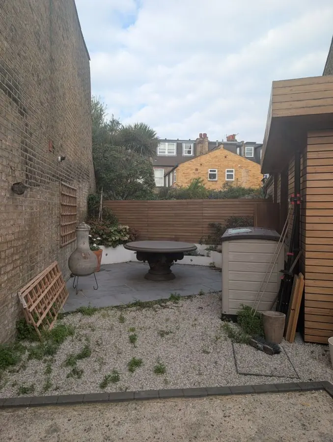 Rose and foxglove courtyard: the garden before