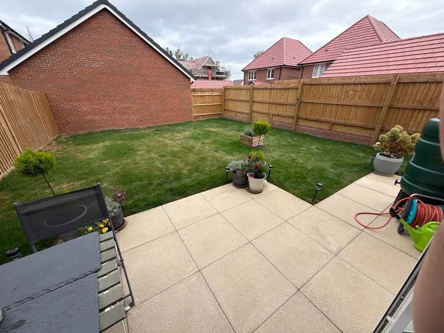 New build garden with a pergola and raised beds: the garden before