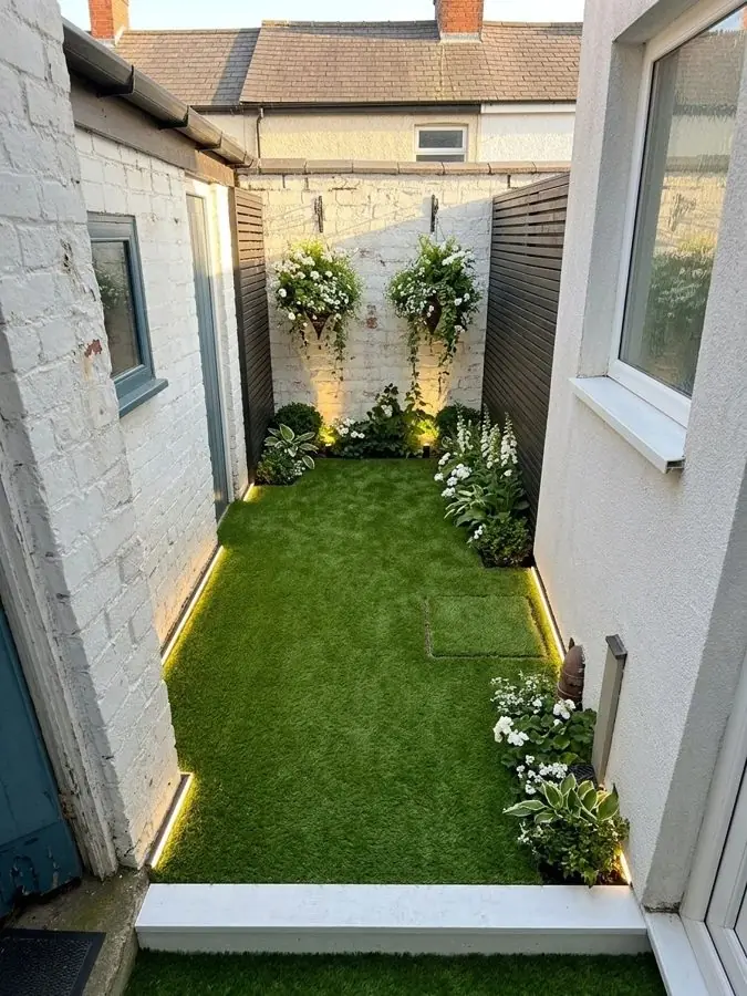 Side passage turned into a slim lawn, redesigned
