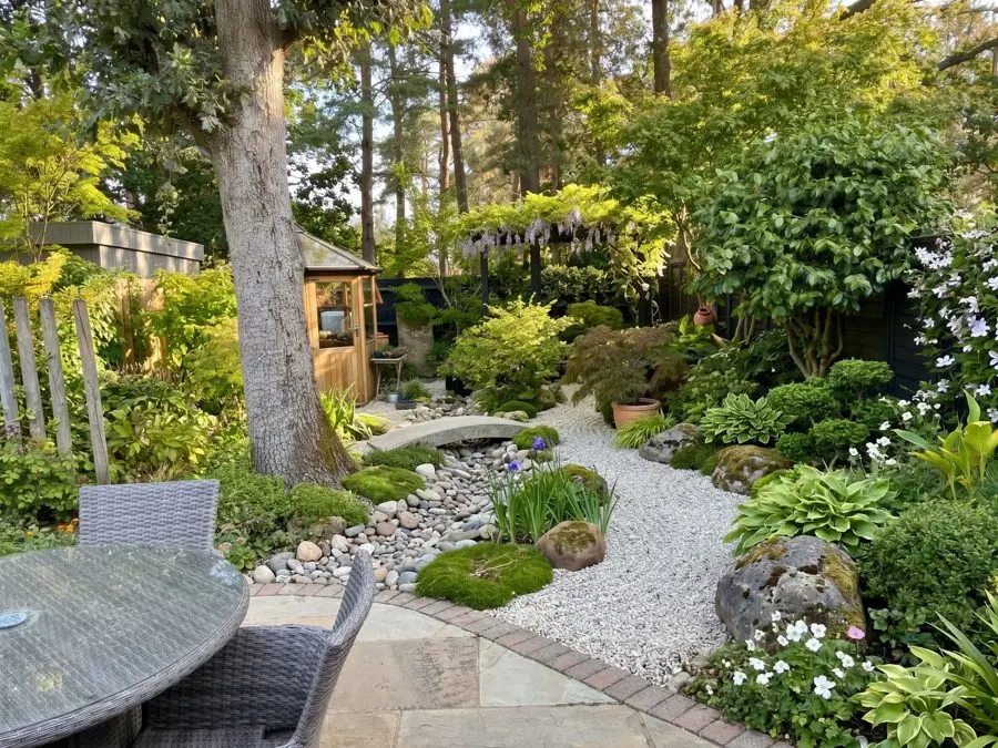 A pebble stream under pines, a Japanese garden idea